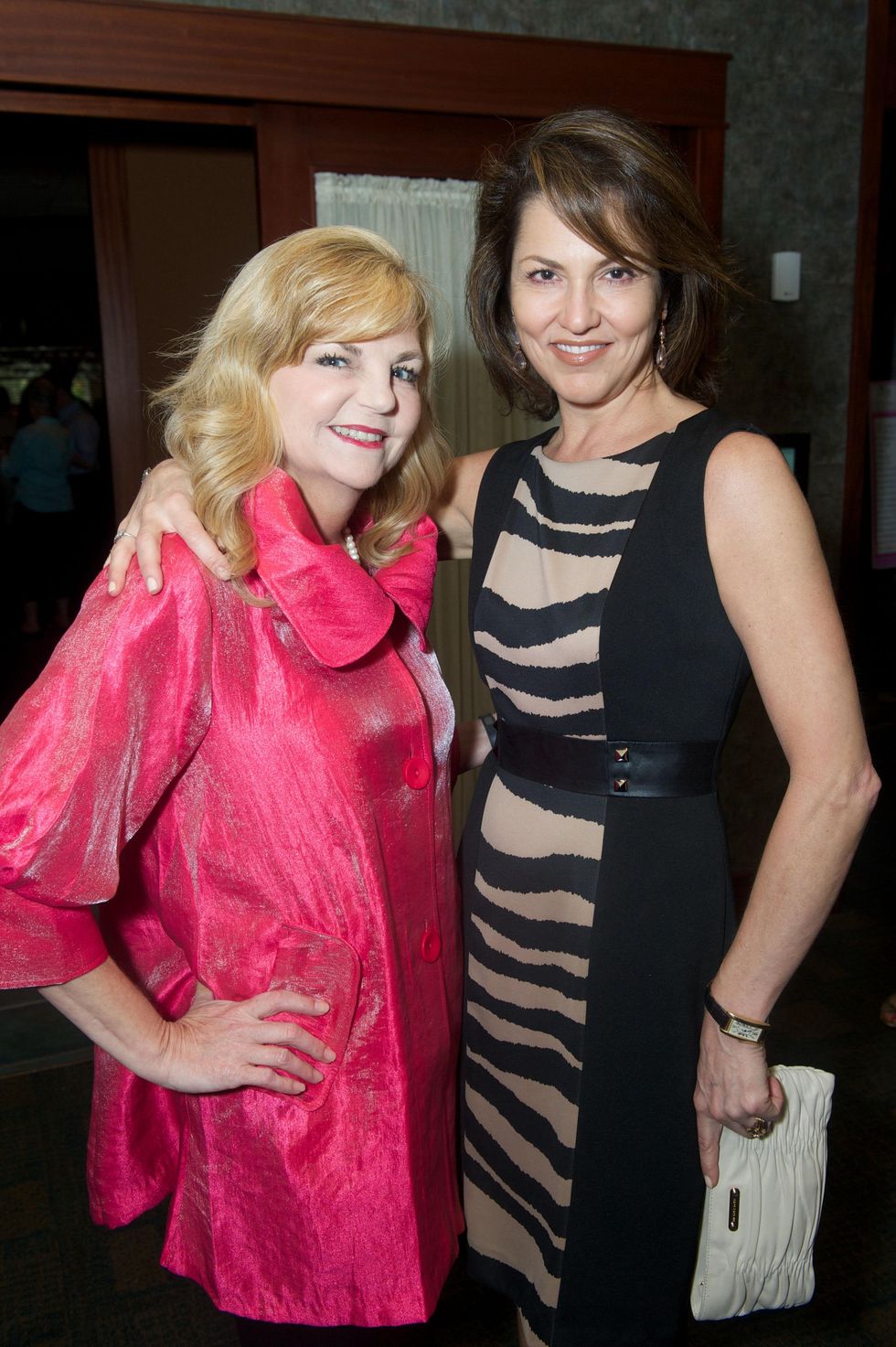 17 Kim Padgett, left, and Jessica Rossman at the Holly Rose Ribbon Shades of Roses kick off party July 2014