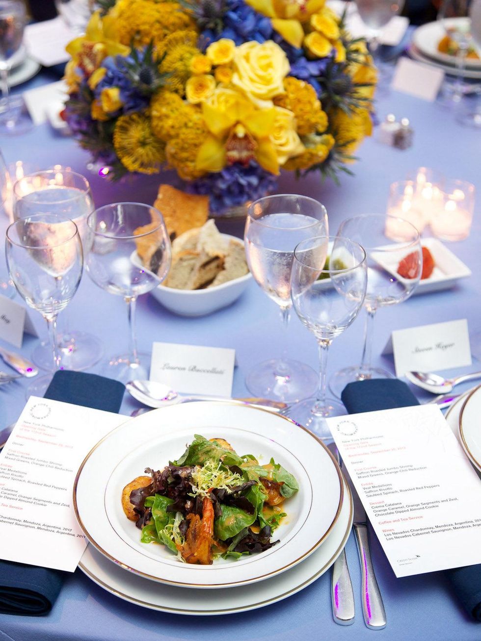 17 table setting place setting salad flower arrangement at the New York Philharmonic Opening Night October 2013