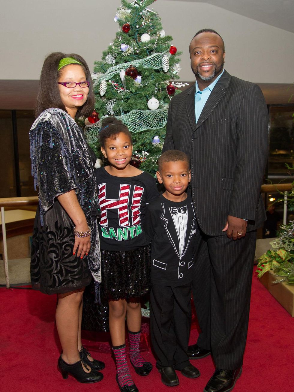 17 Tracey Eagleton, from left, Elizabeth Eagleton, Landre Eagleton Jr. and Landre Eagleton at the Alley Theatre's Deck the Trees Celebration November 2013