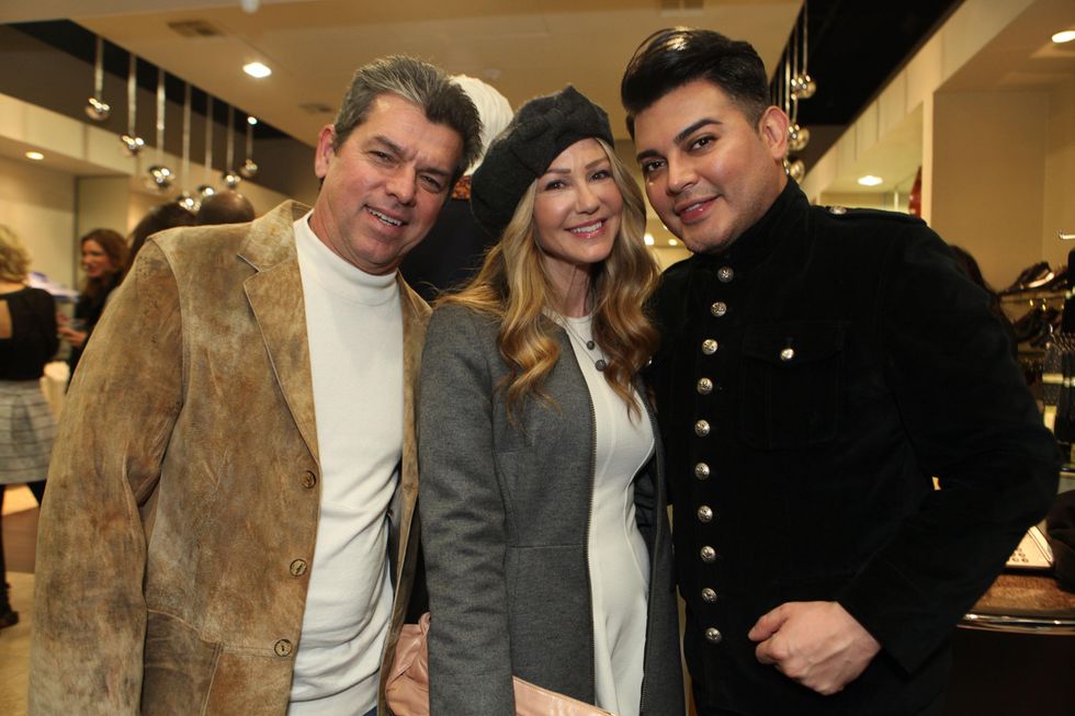 1736 Don and Patti Murphy, from left, with Edward Sanchez at the Festari for Men Christmas Party December 2013