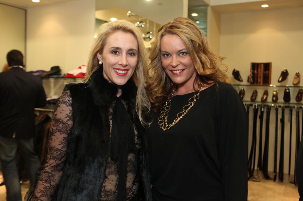 1791 Christie Sullivan, left, and Megan Sutton-Reed at the Festari for Men Christmas Party December 2013