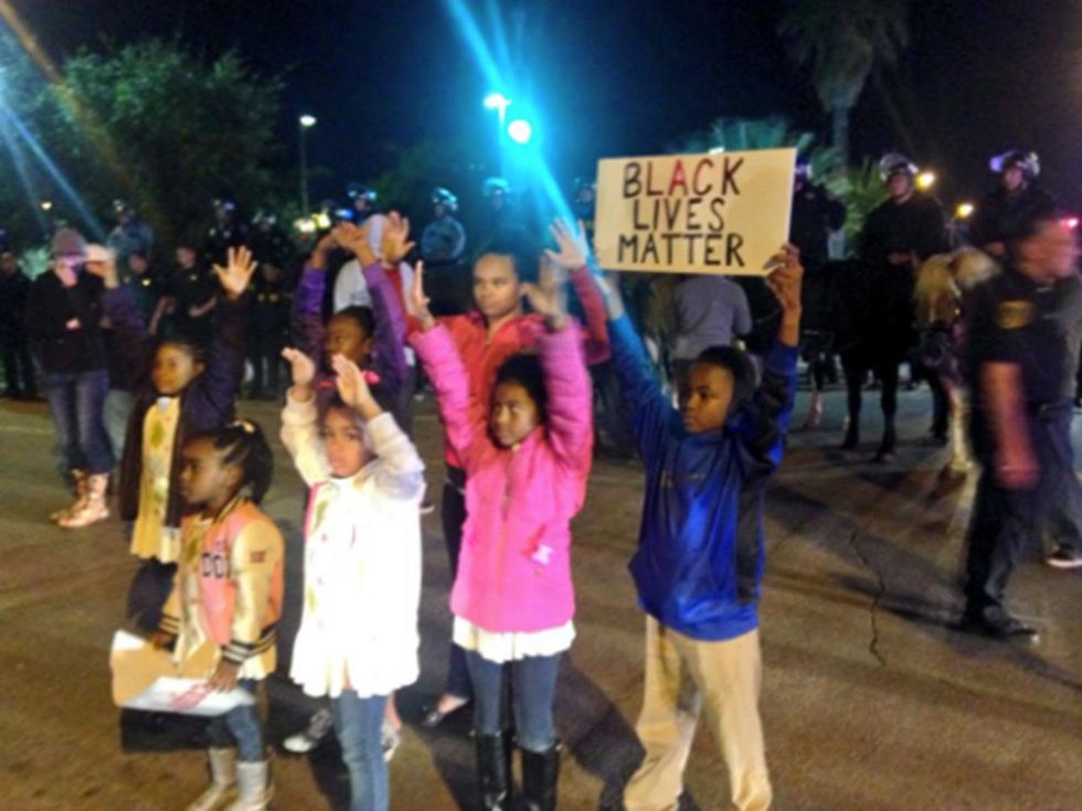 18 Houston Ferguson protest November 2014 The babies out here protesting with us. #Houston #Ferguson