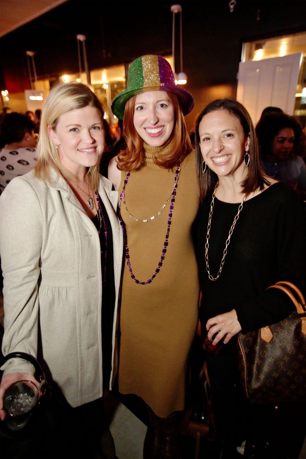 18 Sara Schleicher, from left, Charlotte Cameron and Emily Duncan at Gray\u2019s Public House Mardi Gras grand opening benefiting Urban Green February 2015