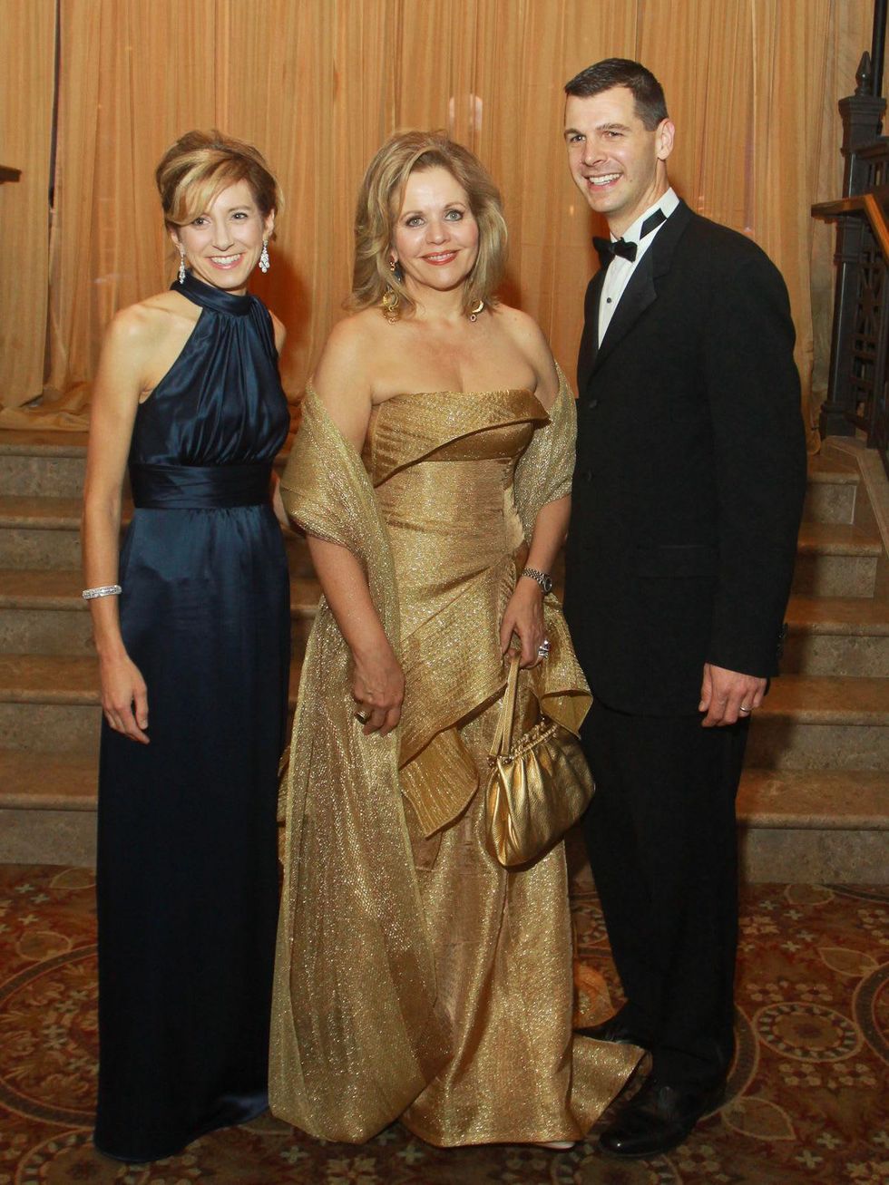 185 Renee Fleming, center, with Christina and Mark Hanson at the Houston Symphony gala.