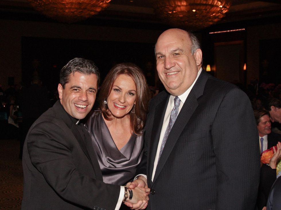 189 Holocaust Museum Moral Courage Award May 2013 Father T.J. Martinez, a newly elected member of the Museum\u2019s Board of Advisors, with Museum Chair Tali Blumrosen and Benjamin Warren