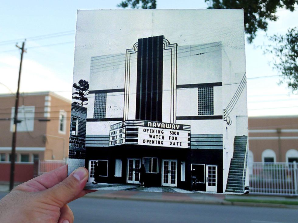 18th Annual Eastwood Historic Home Tour October 2013 person holding photo of Navaway Theater