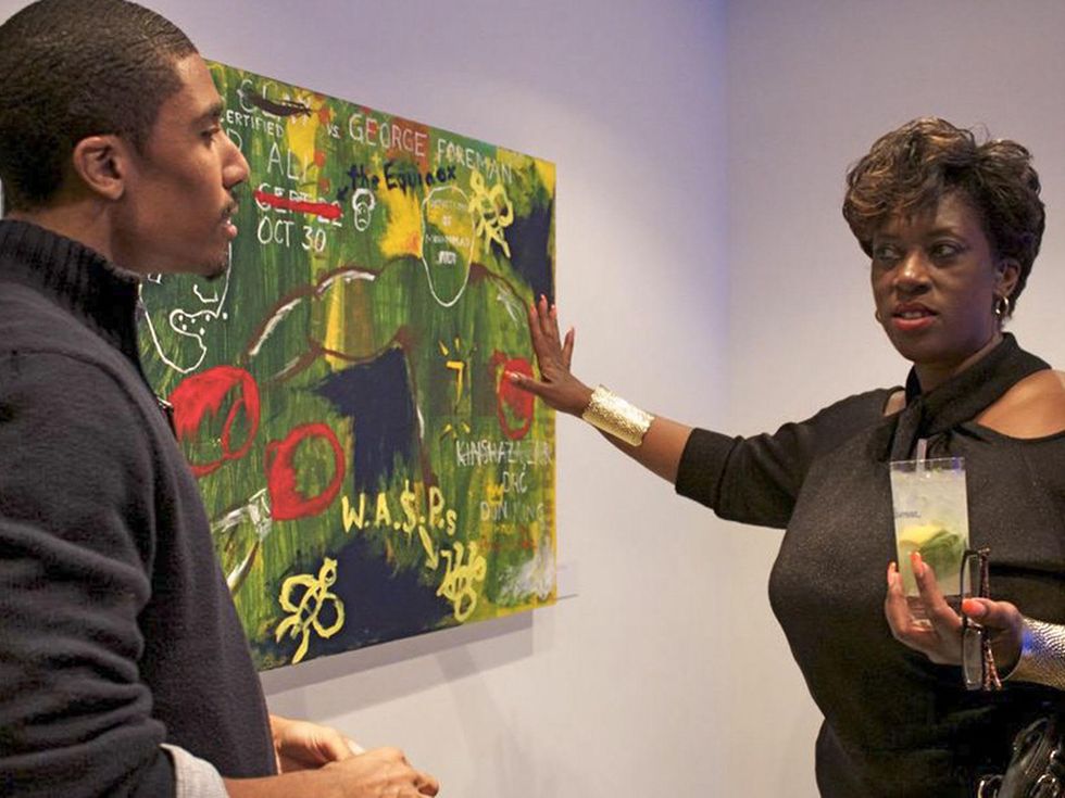 19 admiring Jonathan Carroll artwork at the HMAAC Gala November 2013