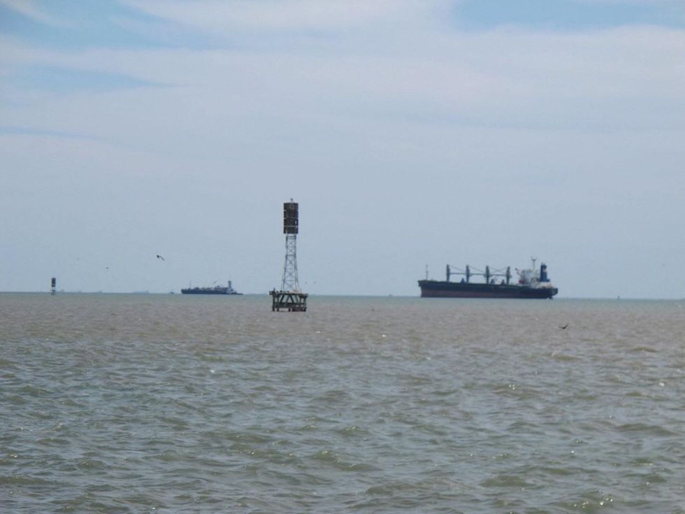 19. Katie Oxford Galveston oil spill March 2014 Tankers waiting just outside Galveston Bay. Note orange tint in water