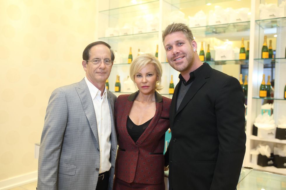 193 Robert and Shelly Rudin, left, and Michael Morton at the Uptown Blow Dry grand opening in Vintage Park March 2015
