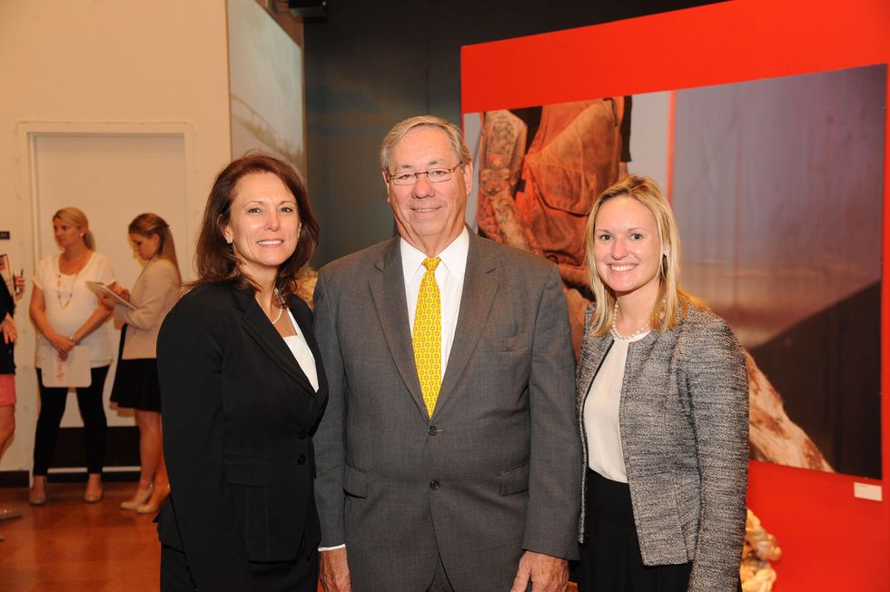 2 5433 Phyllis Saathoff, from left, Tom Kornegay and Jessica Shaver at the Port of Houston library exhibition celebration September 2014