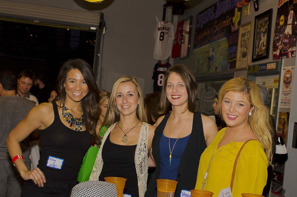 2 Ashley Smart, from left, Nicole Serrano, Hannah Weir and Sydney Scotton at the Bear Bryant Awards young professionals party October 2014