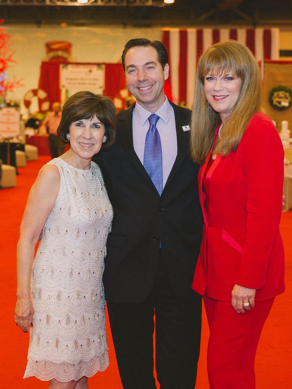 2 Cynthia Brown, from left, Jim Nelson and Lynda Transier at the Nutcracker Market preview party November 2013