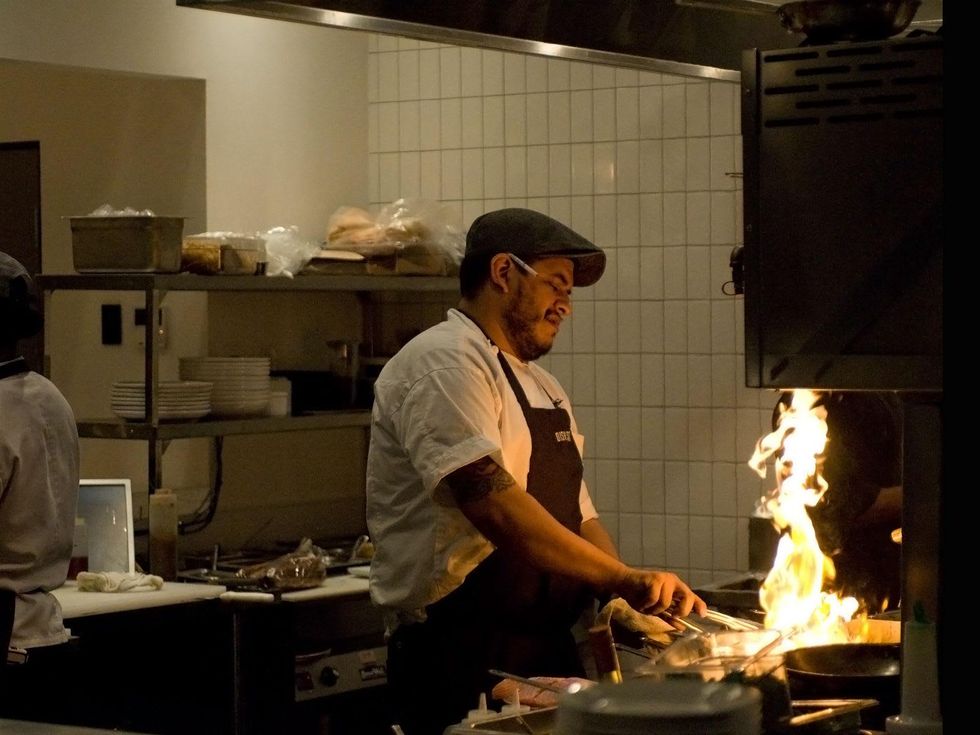 2 Dish Society tasting chef at stove January 2014