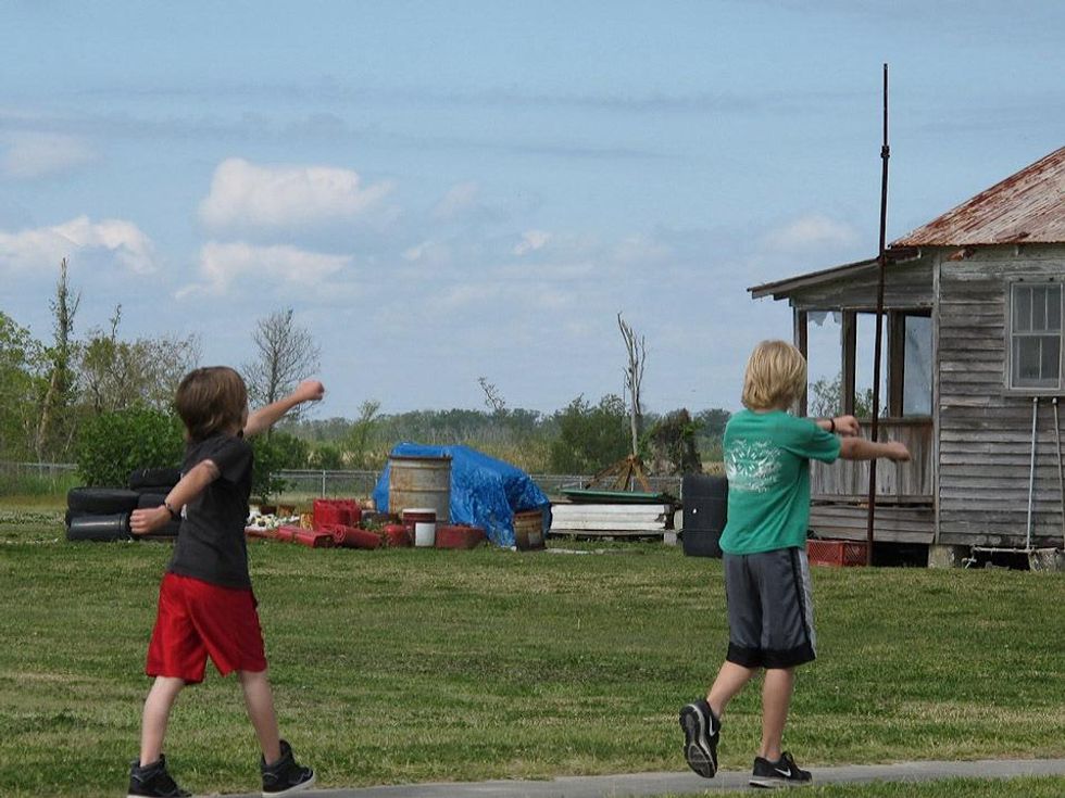 2 Katie Oxford Louisiana Revisited Part 10 June 2013 boys walking in the \u201cWalking Way of the Cross.\u201d