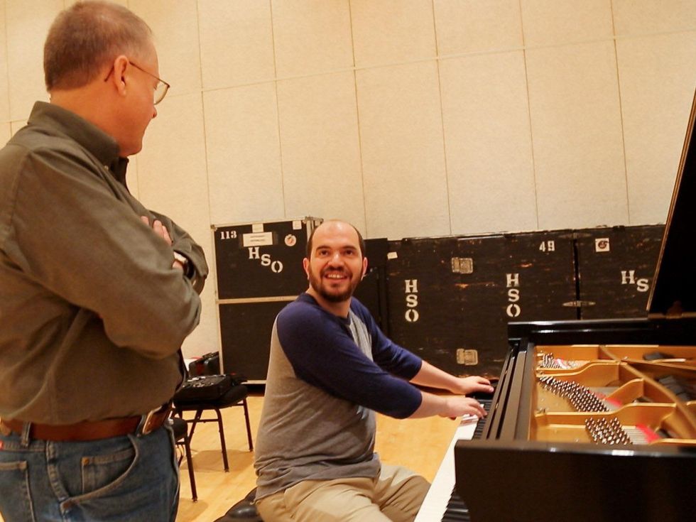 2 Kirill Gerstein prepares piano for Houston Symphony performance September 2013