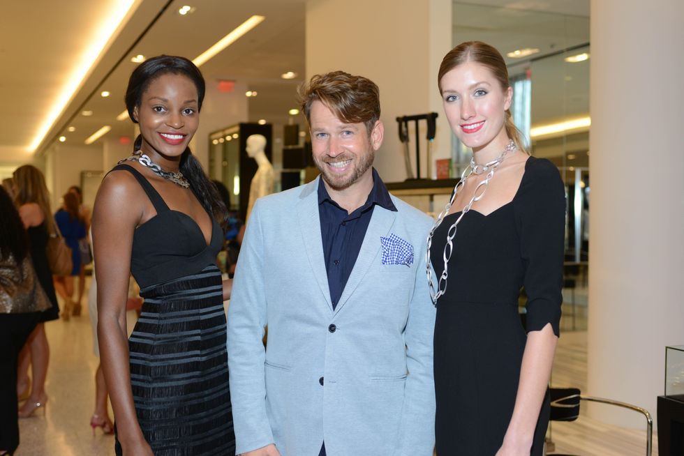 2 Models Cora Uwajeh, left, and Kristin Qualia with Jeff Shell at the WOW Summer Soiree August 2014