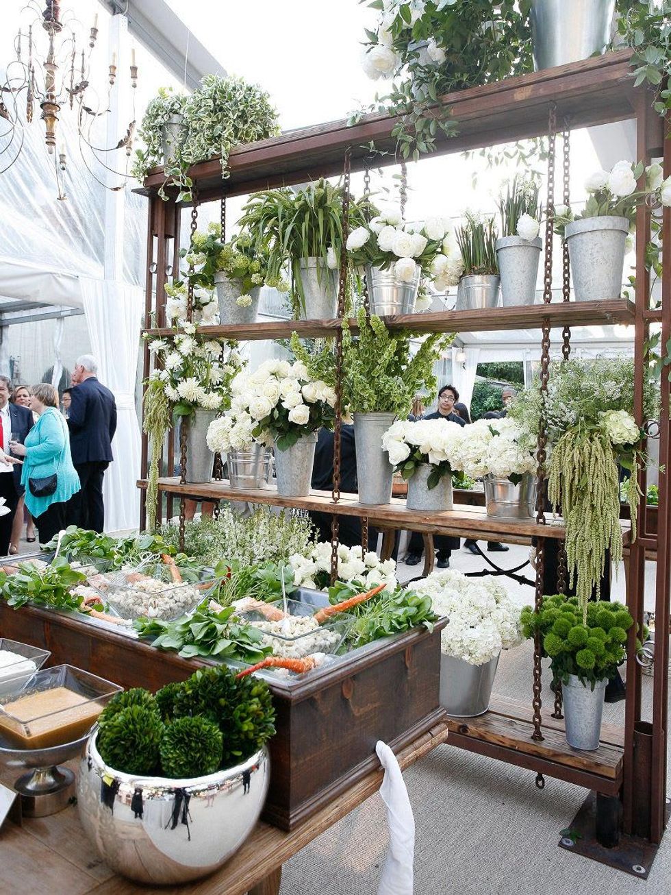 2 scene venue with flowers and people at Fraser's Friends dinner