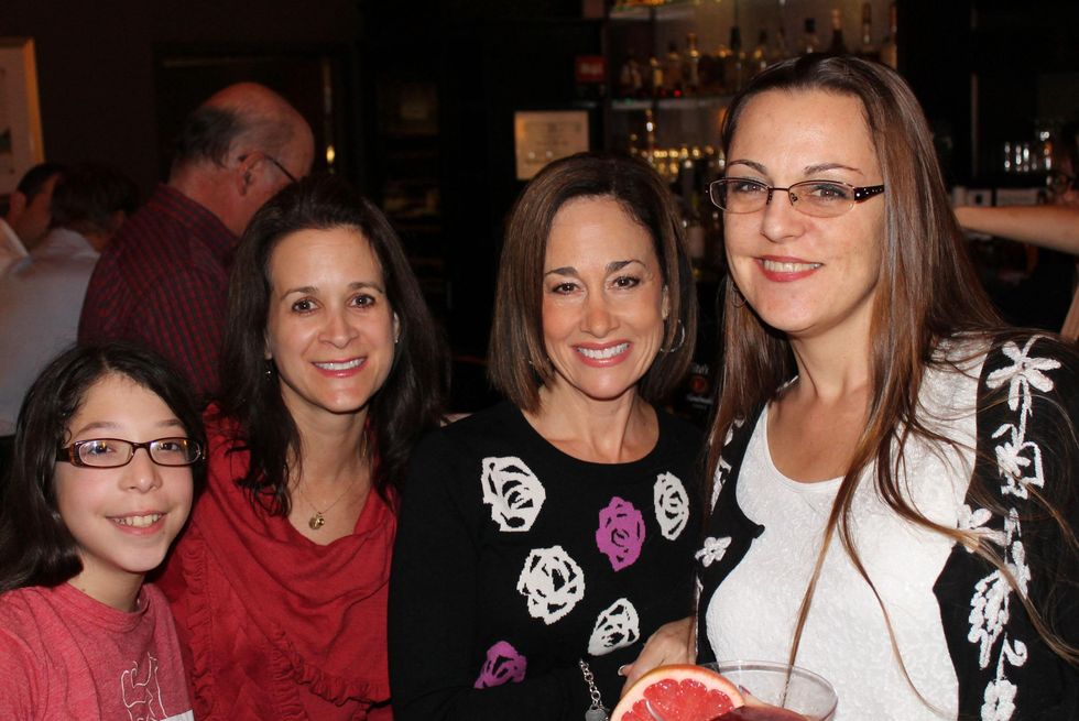 20 Montse Sarmiento, from left, Gira Rhame, Laura Davidson and Jill Buie at The Woodlands cocktail reception and gingerbread doghouse auction December 2014
