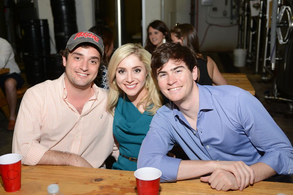 20. Nik Kapetanakis, from left, Kelcy Mayell and James Moreton at the Bayou Preservation Association Herons party June 2014