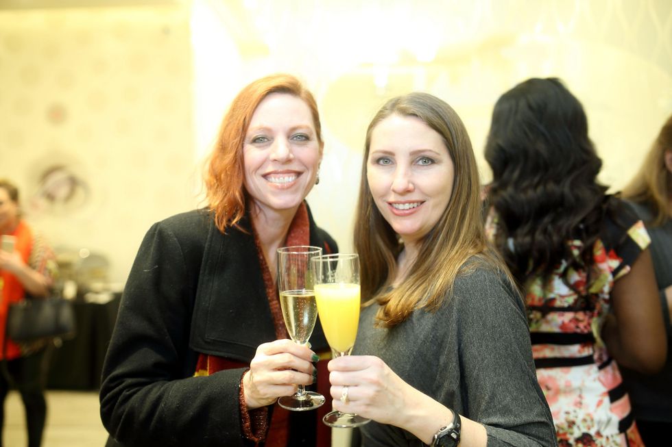203 Liz Graham, left, and Terri Sabol at the Uptown Blow Dry grand opening in Vintage Park March 2015