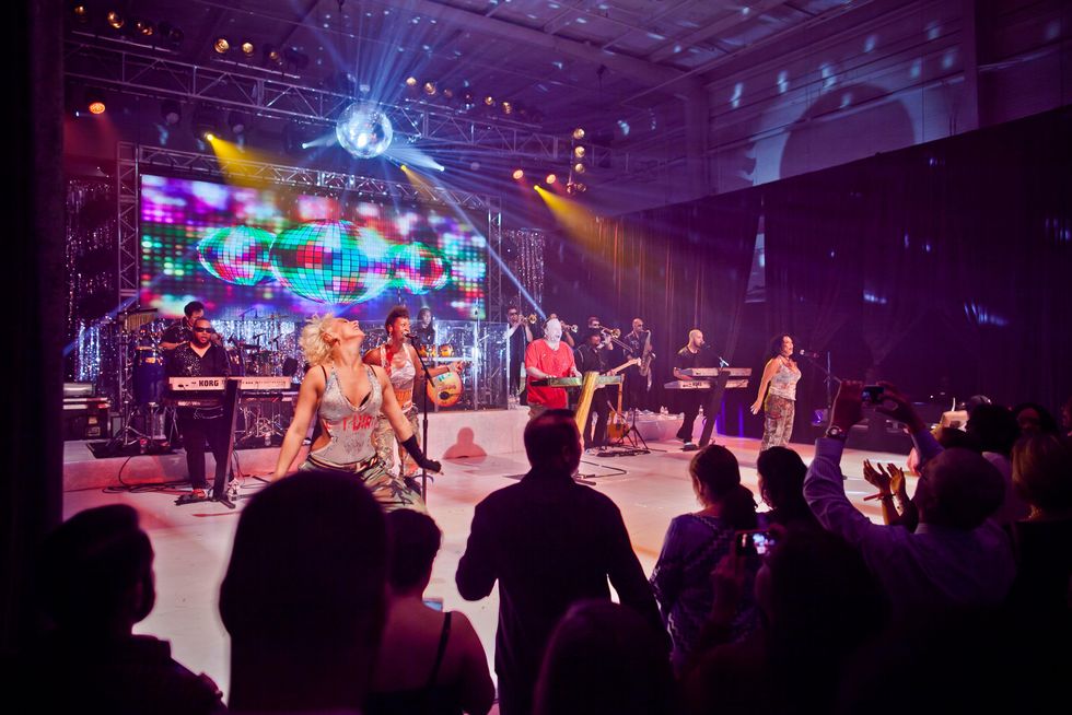 203 Performers on stage at the Patient Financial Services 10th anniversary party April 2015