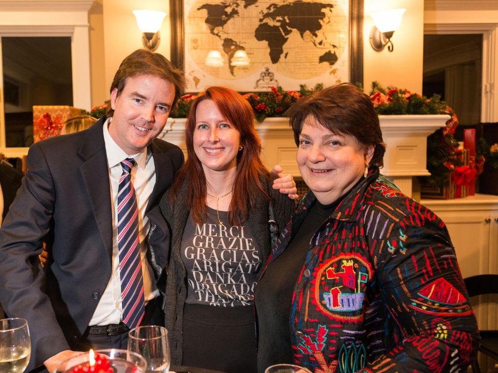 2068 26 John and Allie McPeak, from left, with Leslie Friedrich at the Joiner holiday party December 2013