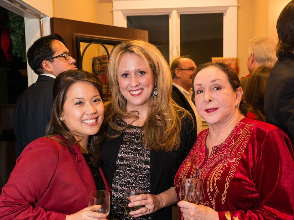 2089 31 Vicky Wu, from left, Ginny Ledwell and Najla Tanas at the Joiner holiday party December 2013