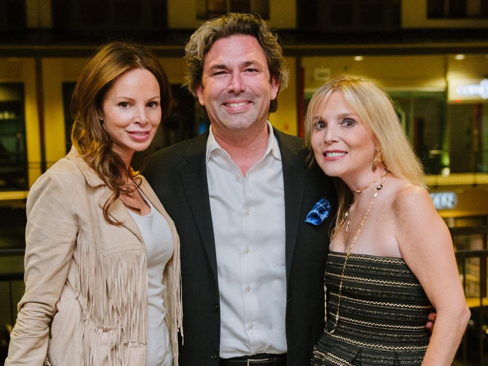 21 Aries Milan, from left, Jared Lang and Kristen Cannon at the CultureMap Social at Saint Genevieve October 2013