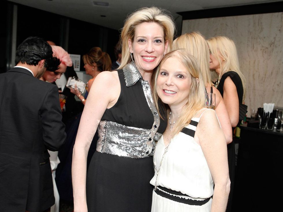 219 Mauri Oliver, left, and Kristen Cannon at the STAGES Xanadu Gala April 2014