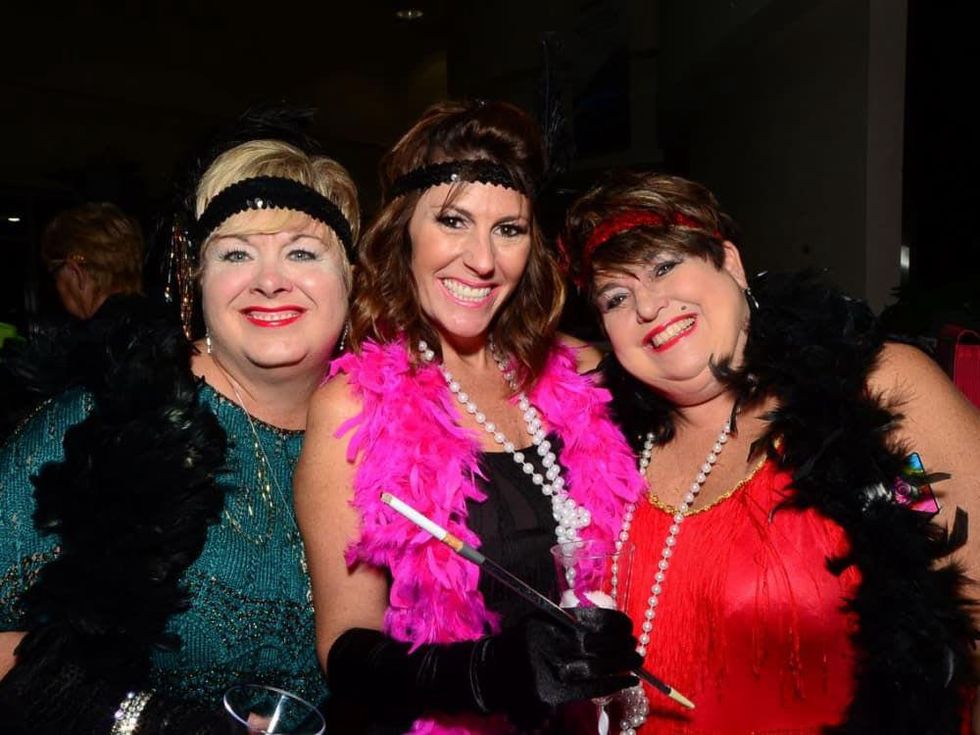 22 Christi Borden, left, Linda Burnett and Julie Lower at the Fellas and Flappers Sunshine Kids event October 2013