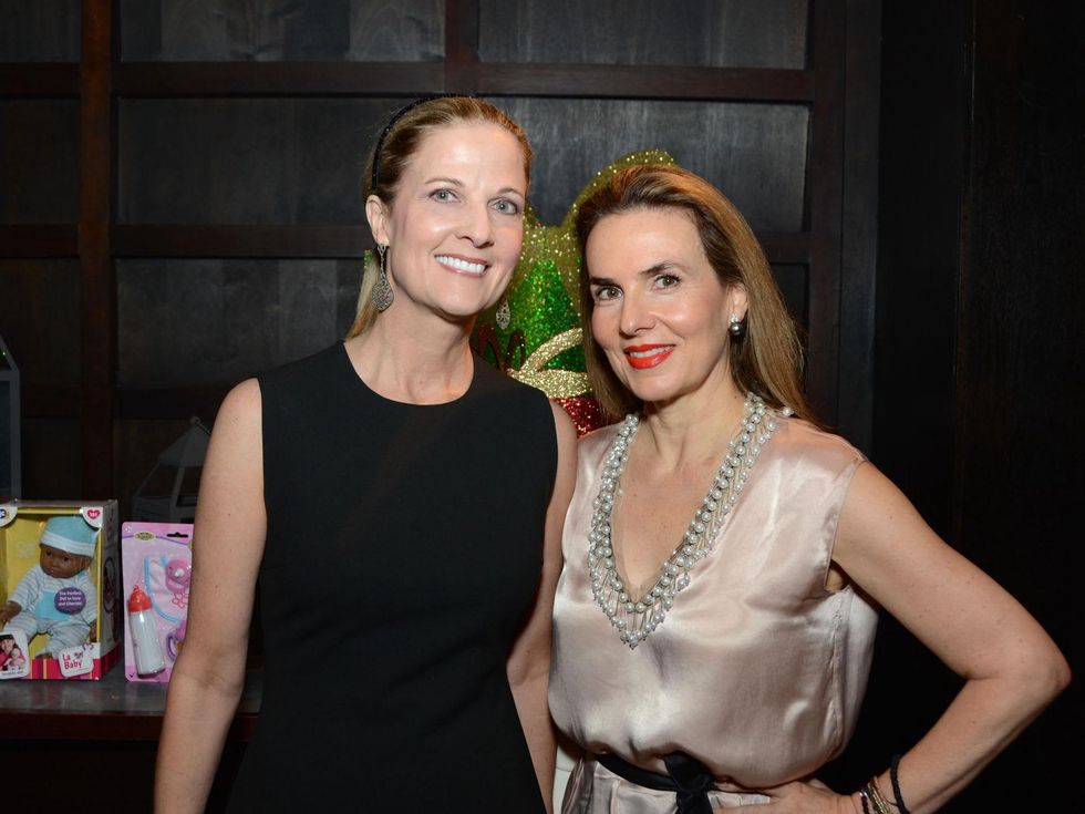 22 Melinda Stubbs, left, and Celina Hellmund at Joyful Toyful December 2014