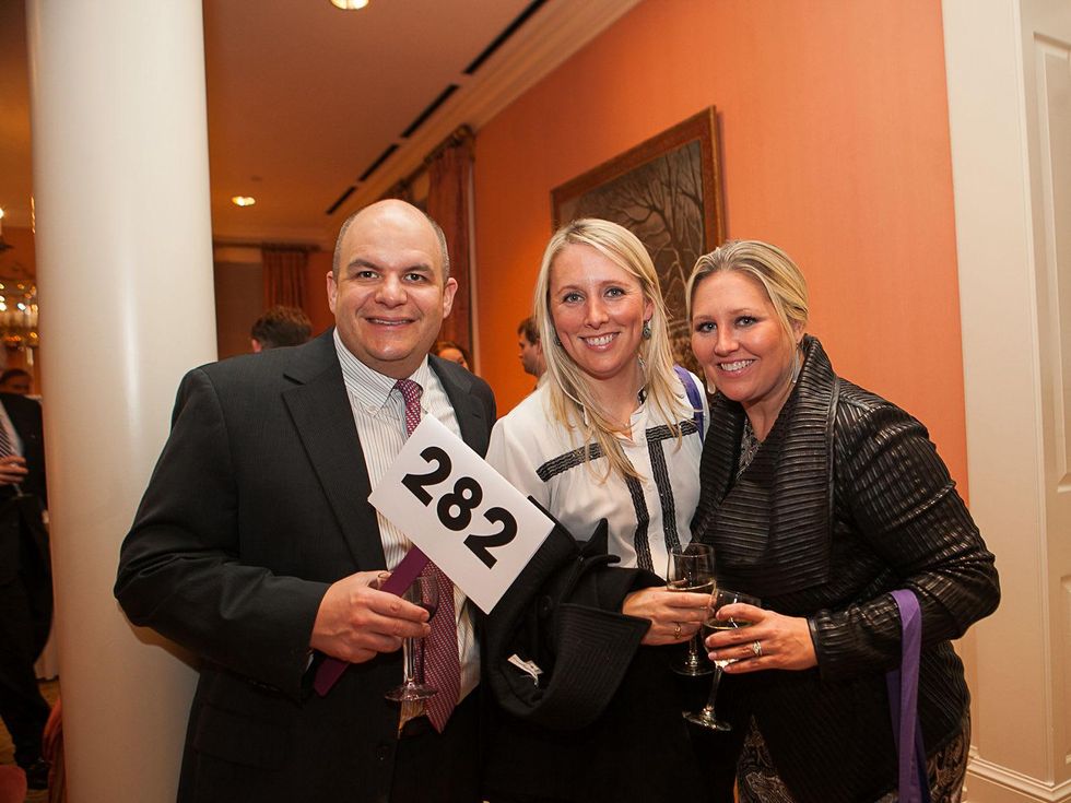 22 Patrick Chastang, from left, Liz Anders and Meredith Chastang at the Houston Center for Photography Print Auction February 2014