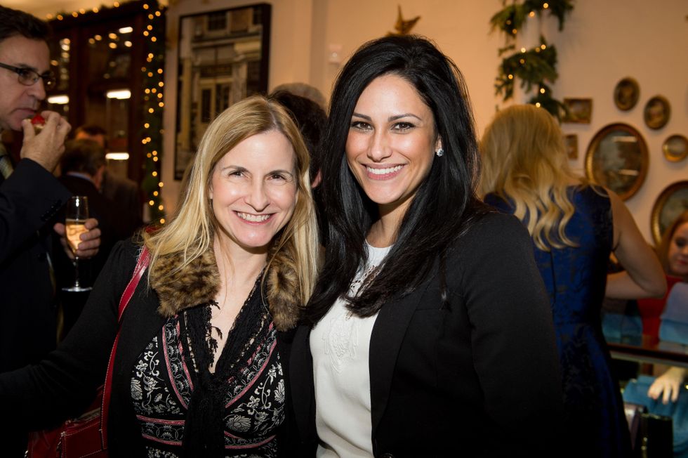 22 Wendy Reeves, left, and Amber Joy at the Valobra Pin Oak holiday party December 2014