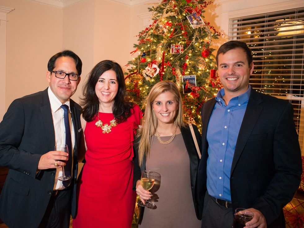 2229 67 Frank Guerra, from left, Jamie Joiner, Olivia Froncillo and Ryan Wirth at the Joiner holiday party December 2013