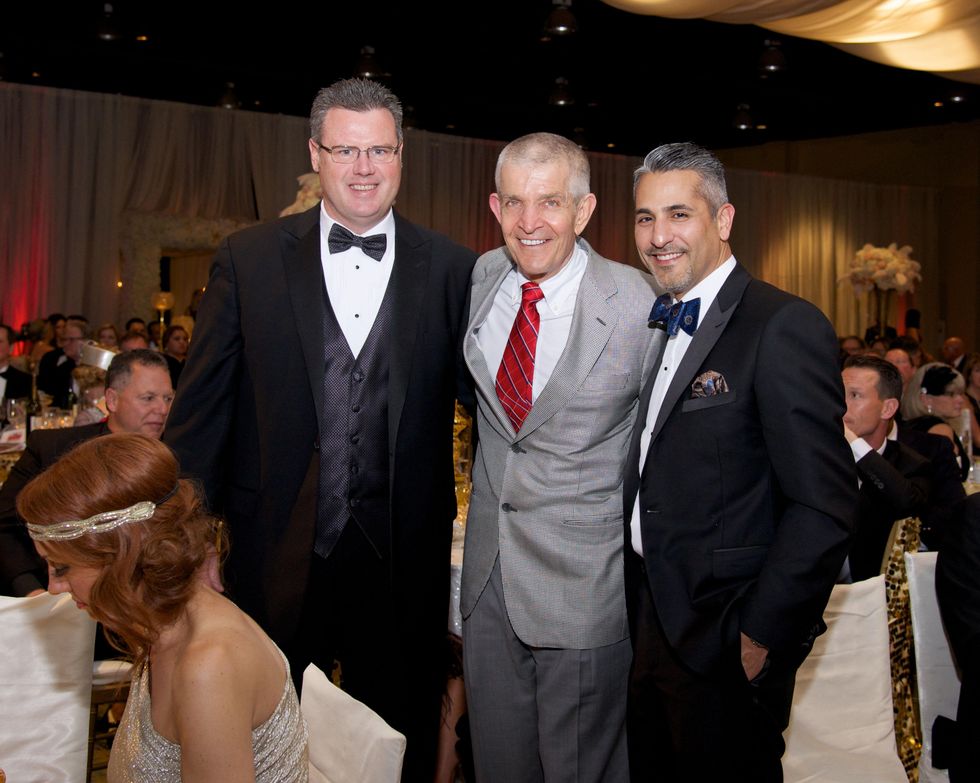 23 8609 Rick Doyle, from left, Jim McIngvale and Lonny Soza at the American Heart Association's Montgomery County Heart Ball February 2015