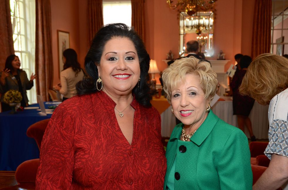 23 Michelle Fraga, left, and Lolita Guerrero at the Latin Women's Initiative Luncheon October 2014