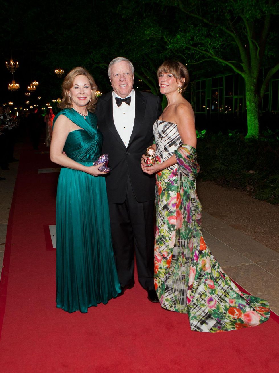 23 Nancy and Rich Kinder, from left, with Franci Crane at Gala on the Green February 2014