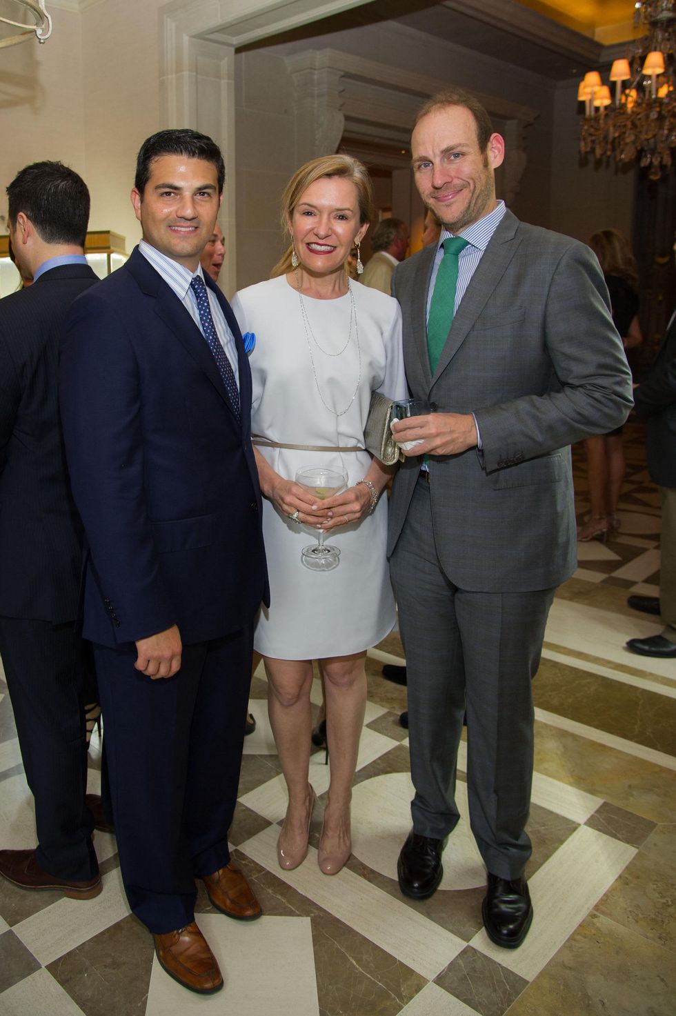 23 Segev Zadok, from left, with Katie and A.J. Brass at the Zadok jewelry dinner October 2014
