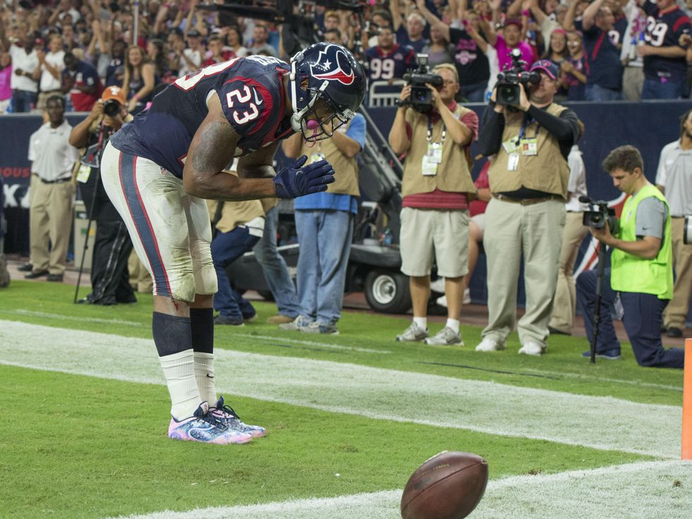 23 Texans vs. Colts October 2014 Arian Foster touchdown prayer bow