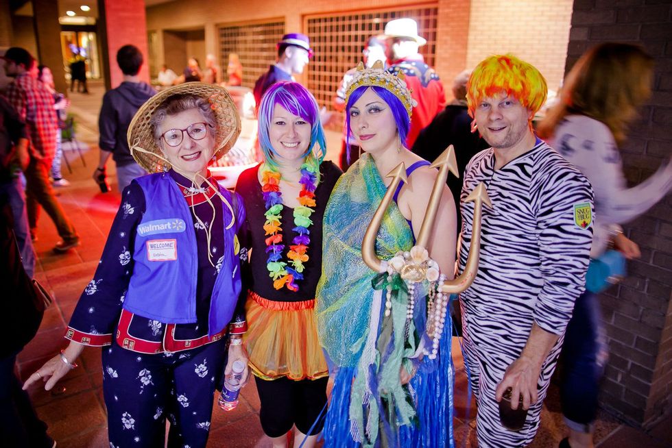 237 Entera, from left, Angela Moore, Laura Roark and Mark Lies at the Art Car Ball April 2015