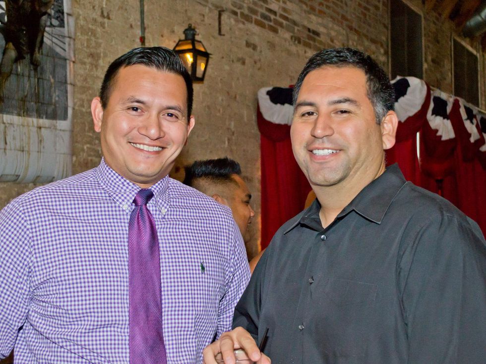 24 Derek Mendoza, left, and Louis Cardenas at the Young Professionals Grand Prix kick-off party June 2014.