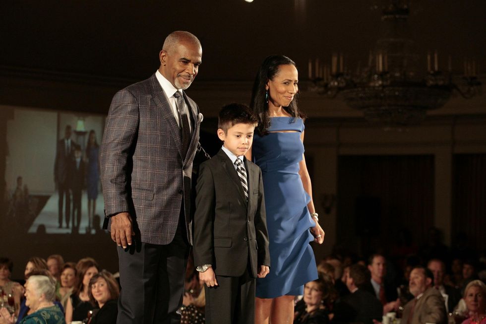 24 Jon Carroll, from left, Charlie De Carlos and Gina Carroll at the Texas Children's Hospital Celebration of Champions luncheon October 2014