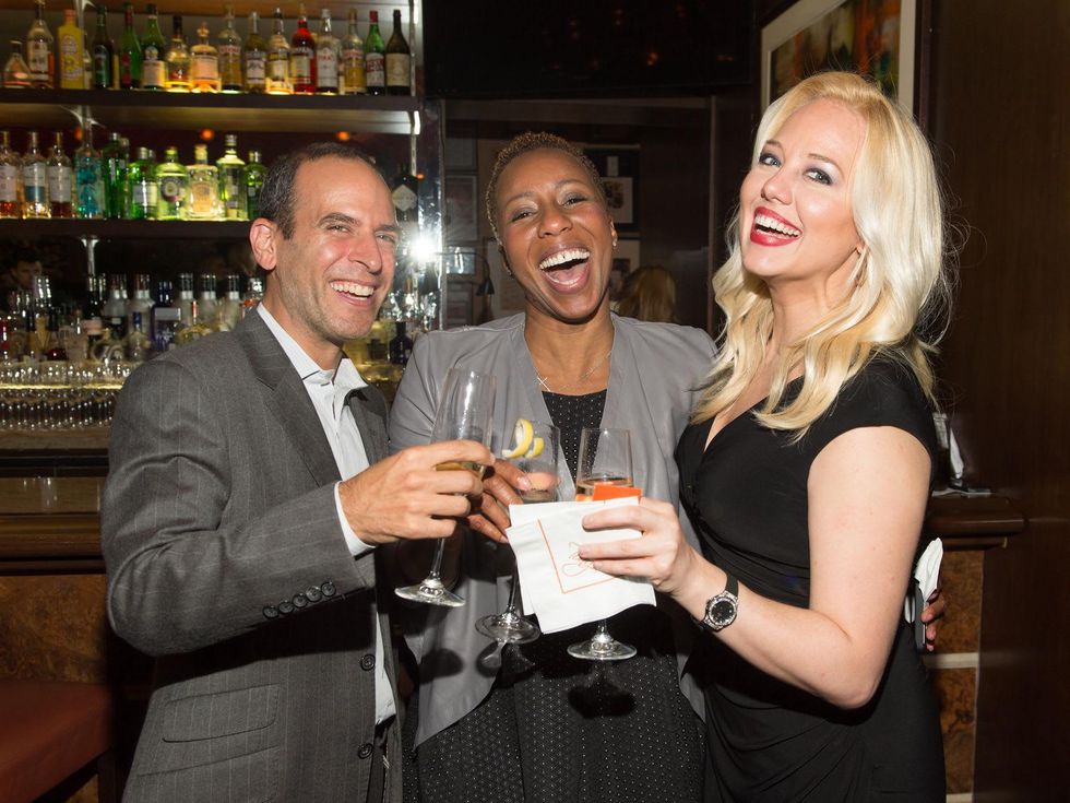 24 Oren Agai, from left, Marva Bradshaw and Holland Vavra at the Hublot dinner party at Tony's October 2013