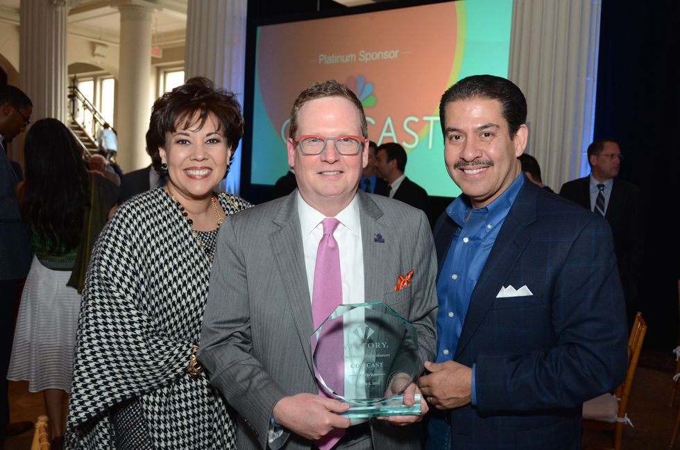 241 Mrs. Garcia, from left, Ray Purser and Adrian Garcia at the Victory Brunch March 2015