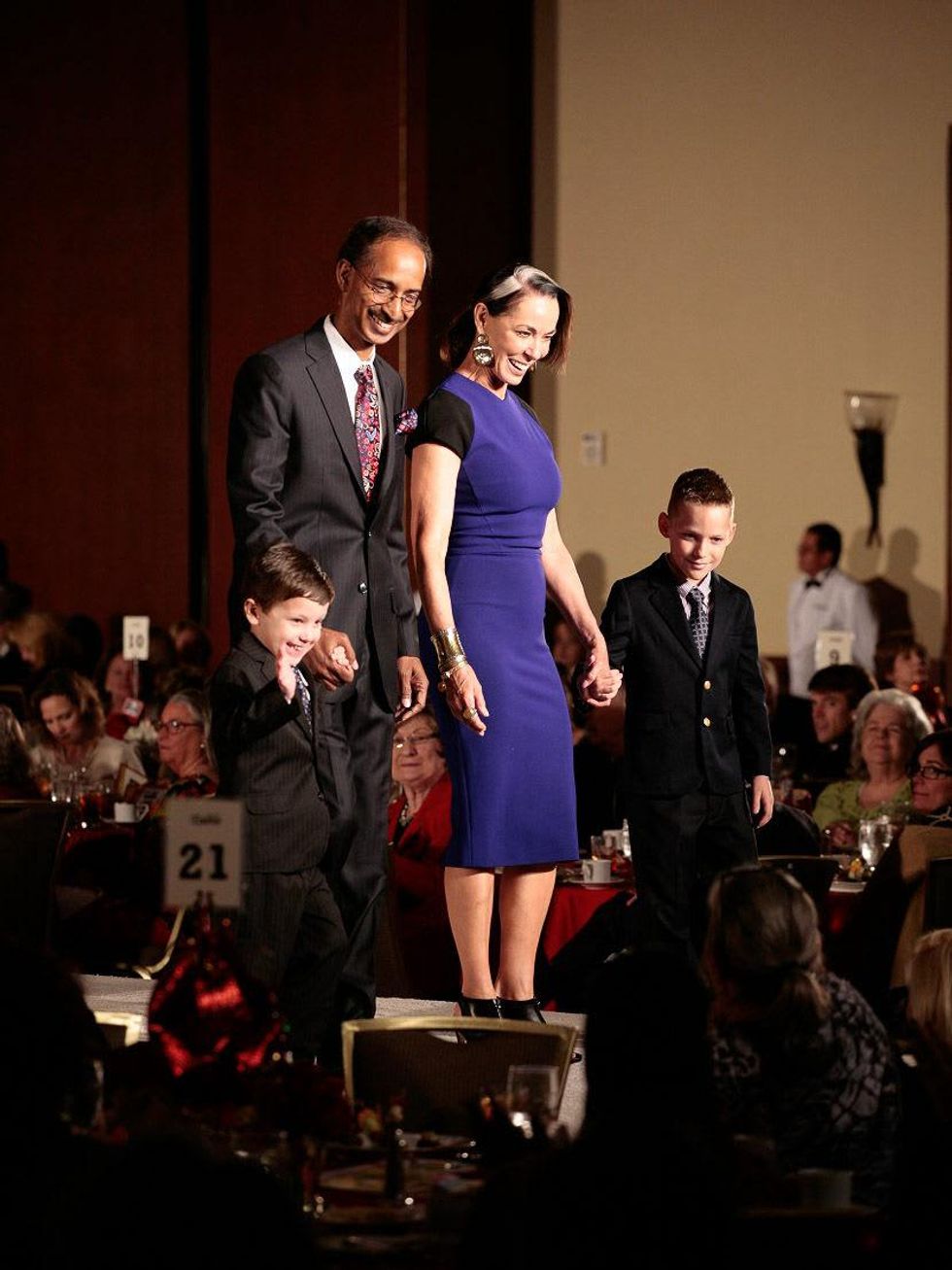 25 Charlie Dina, from left, Dr. Murali Chintagumpala, Sue Smith and Patrick DeClaire at the Celebration of Champions luncheon October 2013