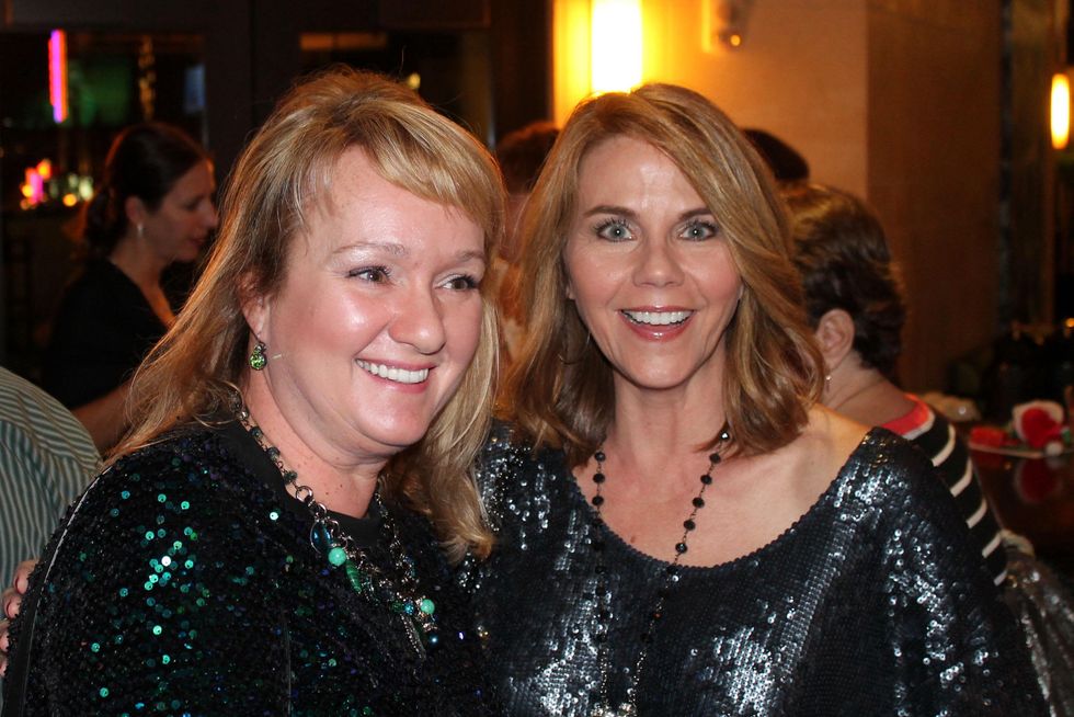 25 Shannon Gornick, left, and Tanis Morse at The Woodlands cocktail reception and gingerbread doghouse auction December 2014