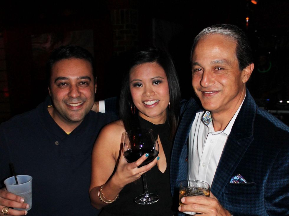 25 Steve Rophail, from left, Kathleen Paz and Saner Nassar at the Eleven XI party November 2013