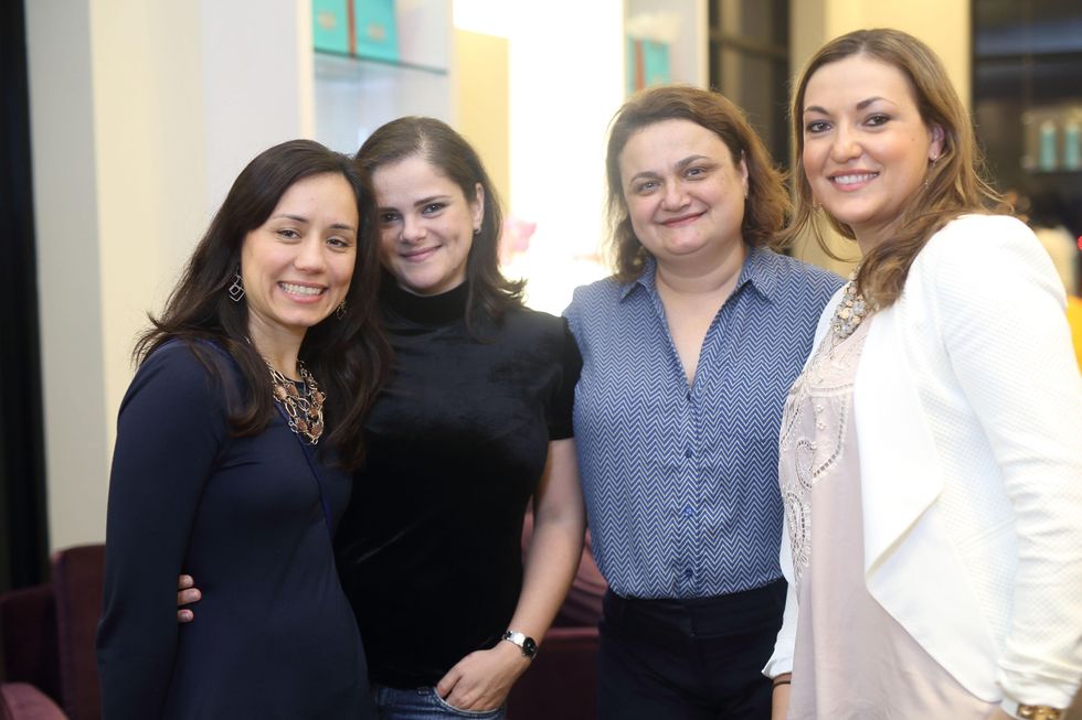 257 Ella Teodorescu, from left, Gabi Nicola, Ioana Lazarescu and Delia Prada at the Uptown Blow Dry grand opening in Vintage Park March 2015