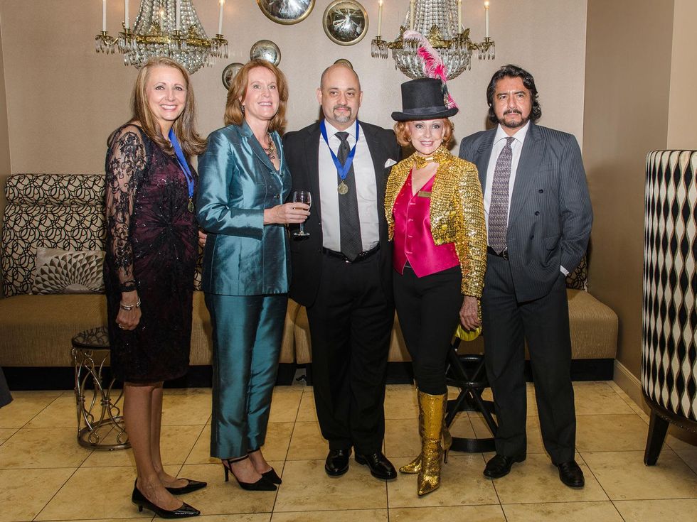 26 Elaine Stolte, from left, Patricia Villafranca, Stephen Morris, Dot Cunningham and Miguel Villafranca at the Be An Angel Gala May 2014