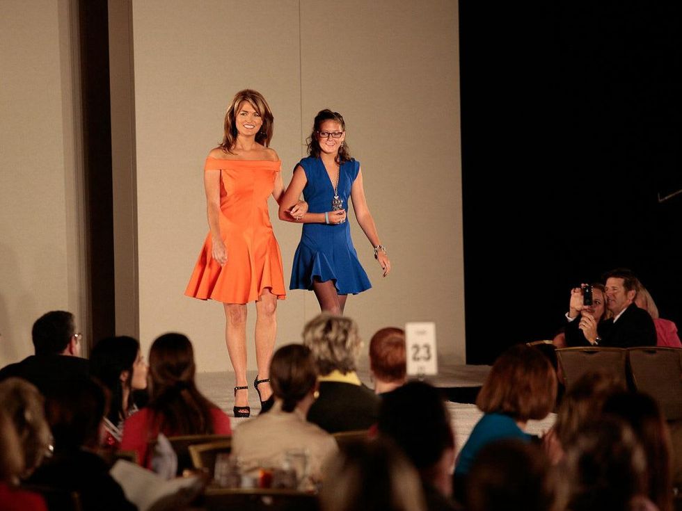 26 Melissa Wilson, left, and Presley Boydstun at the Celebration of Champions luncheon October 2013
